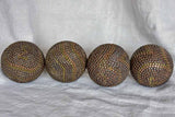 Four antique French petanque balls