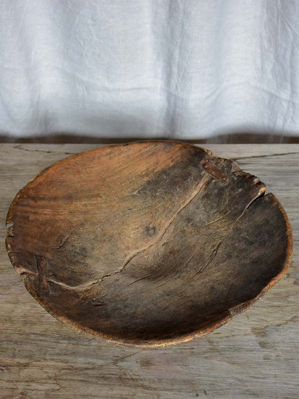 Antique primitive raised wooden bowl