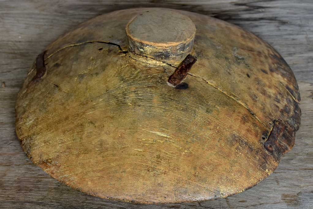 Antique primitive raised wooden bowl