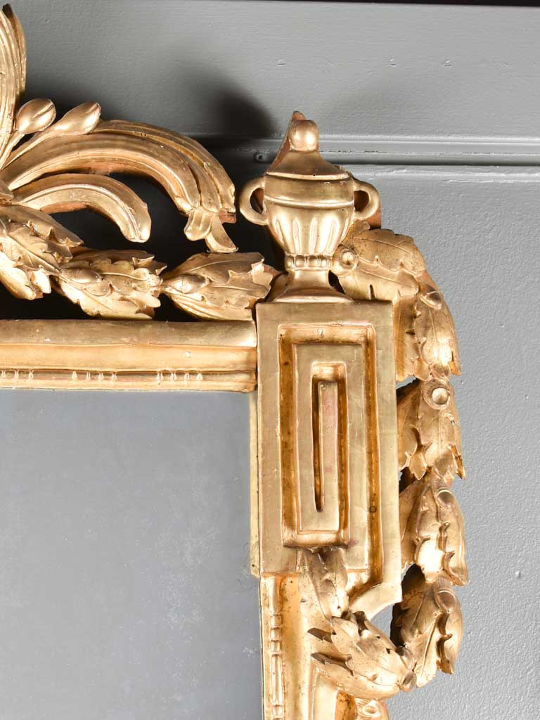 Classic oak-leaf decorated Louis XVI mirror