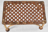 Early-20th-century wrought iron garden foot rest