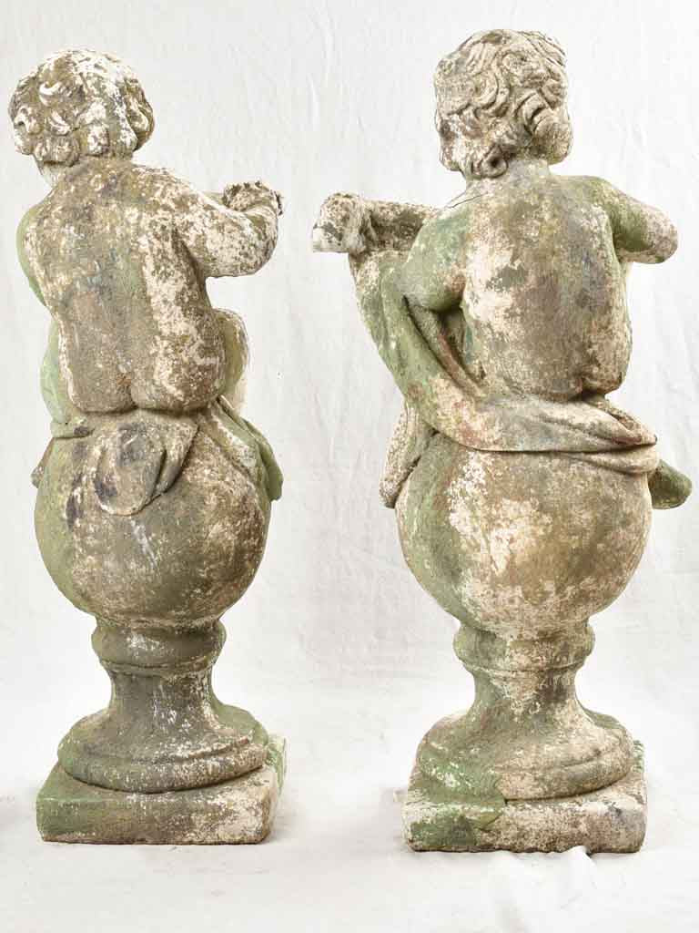 Pair of vintage French garden statues angels playing flute & mandoli