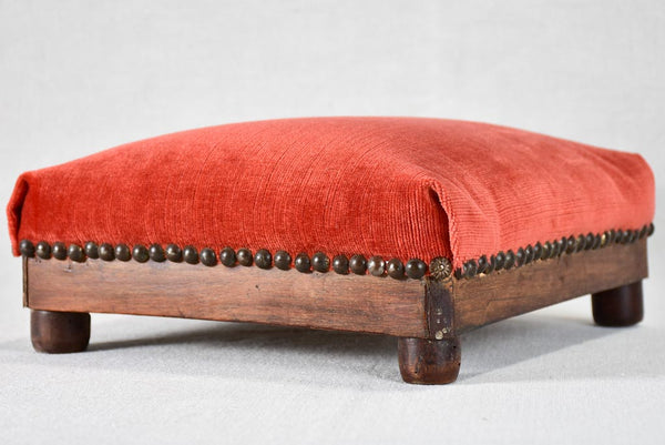 Antique French footrest with red velvet upholstery
