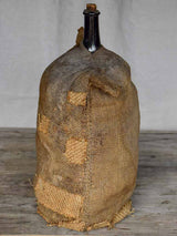 Antique French carboy in jute