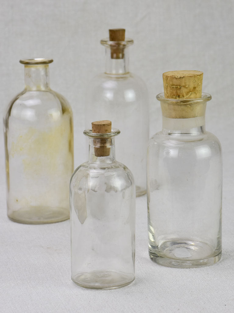 Collection of four small pharmacy flasks - 19th century blown glass