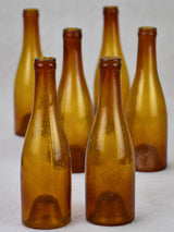Set of six amber glass miniature bottles from the 19th century 6¼"