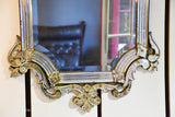 Antique Venetian mirror with decorative frame