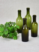 Collection of four miniature blown glass wine bottles from the 19th century 4¼"