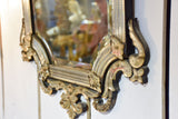 Antique Venetian mirror with decorative frame
