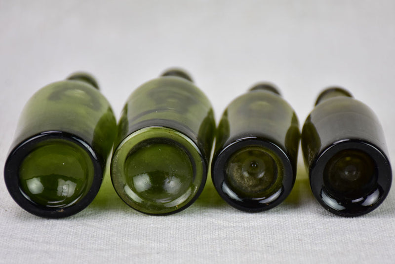 Collection of four miniature blown glass wine bottles from the 19th century 4¼"