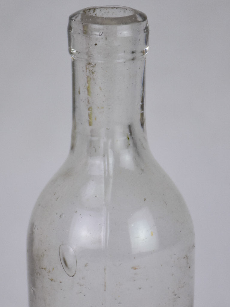 Miniature late 19th century blown glass bottle 4¾"
