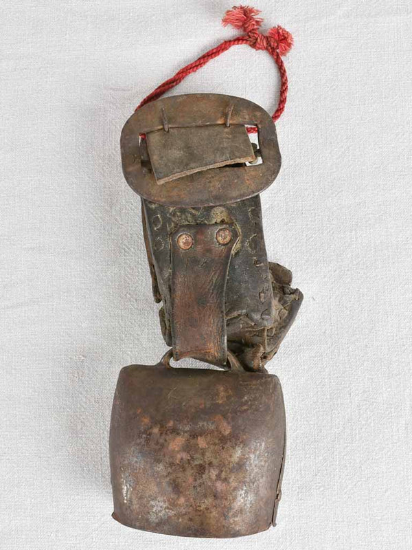 Antique French cowbell with leather collar