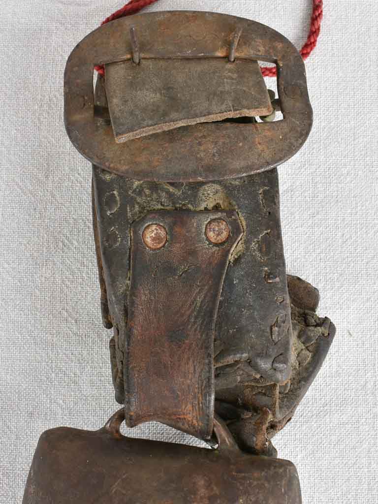 Antique French cowbell with leather collar