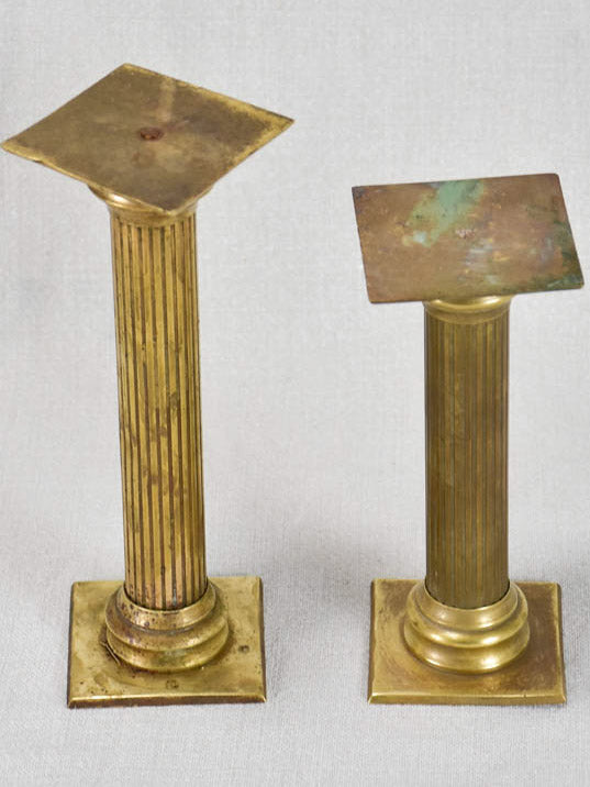 Column-shaped brass boutique pedestals