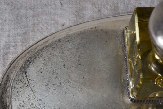 Old-fashioned silver-plated tray with inkwell