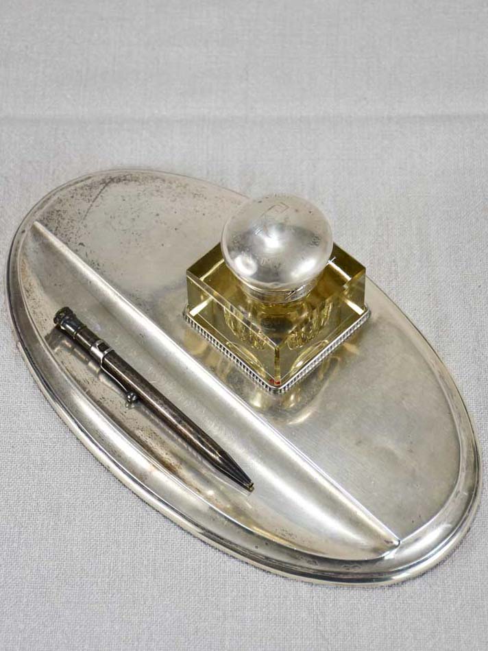 Antique crystal well in silver plate