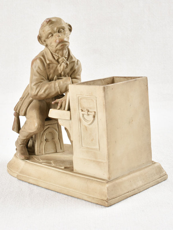 Antique decoration of a monkey playing piano - vide-poche 8¾"