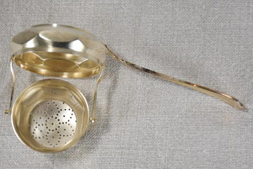 English tea strainer from the 1930's - silver plate