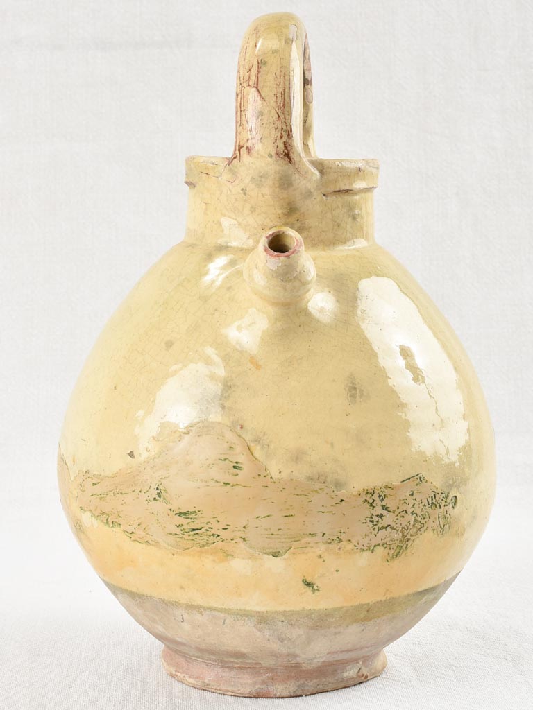 19th century terracotta water pitcher with yellow glaze 13½"