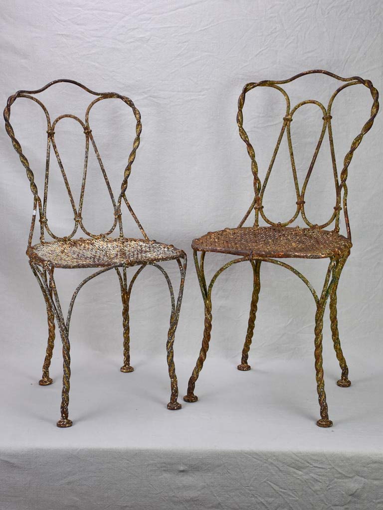 Pair of pretty 19th century French garden chairs with twisted iron frames