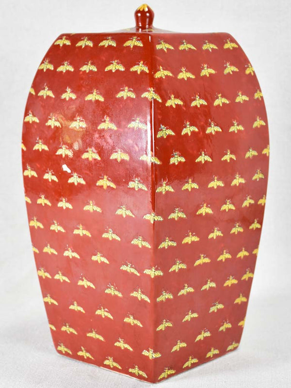 Glazed red Chinese bee-motif pot