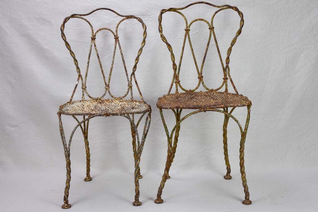 Pair of pretty 19th century French garden chairs with twisted iron frames