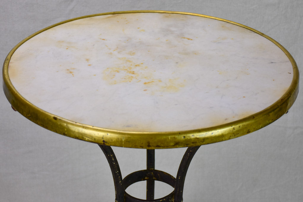 Marble top bistro table with iron base from the 1900's