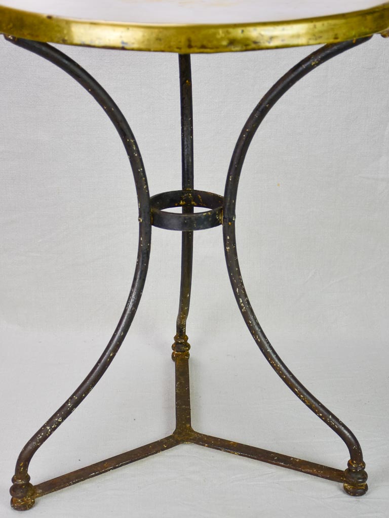 Marble top bistro table with iron base from the 1900's