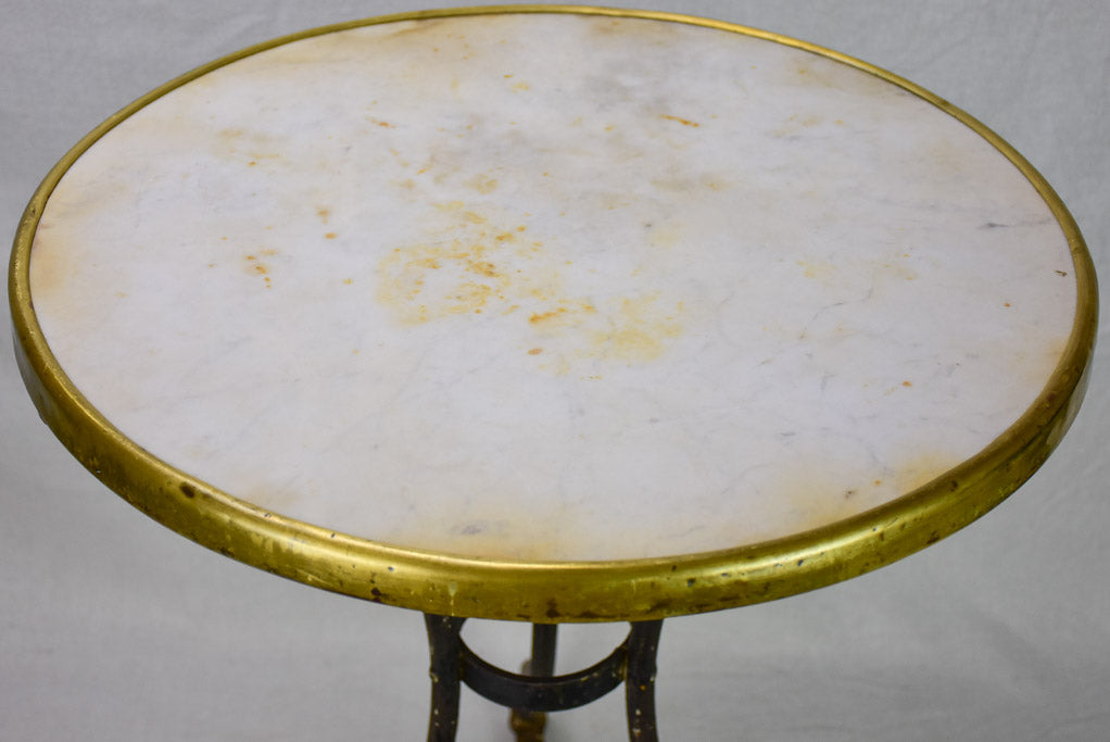 Marble top bistro table with iron base from the 1900's