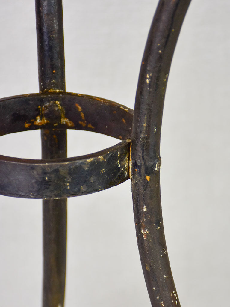 Marble top bistro table with iron base from the 1900's
