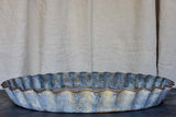 Five large antique French zinc dishes with rippled edge for harvesting resin