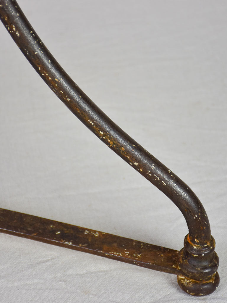 Marble top bistro table with iron base from the 1900's