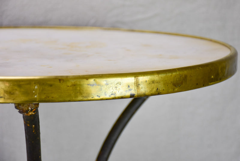 Marble top bistro table with iron base from the 1900's
