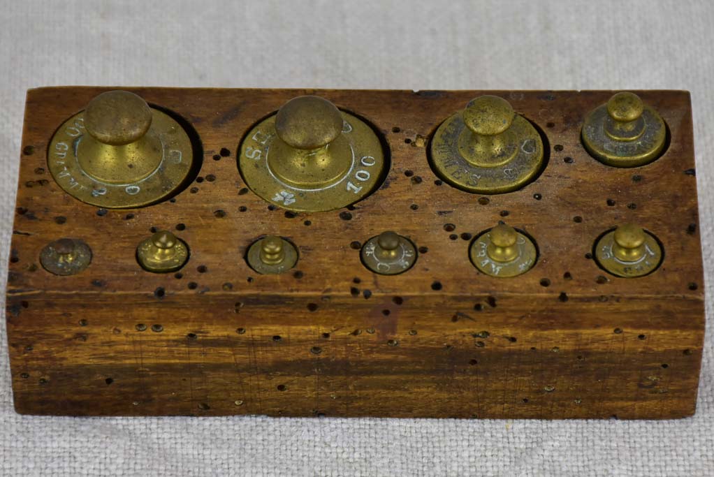 Set of ten antique French weights for scales - 1-200g