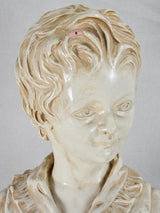 Distressed child bust in terracotta