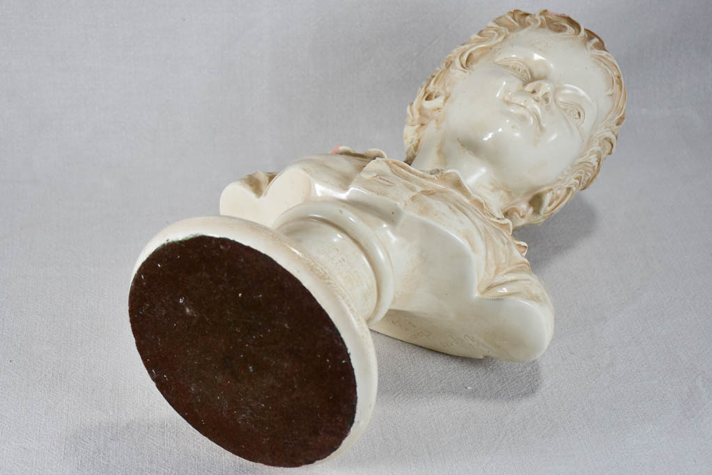 Aged child bust in glossy terracotta