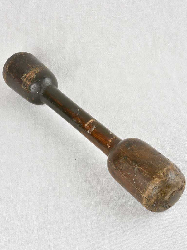 Late 19th century double head wooden pestle 19"