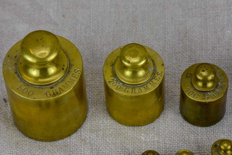 Set of twelve antique French weights for scales - 1-500g