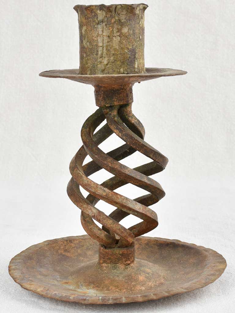 Antique open-spiral bronze iron candlestick