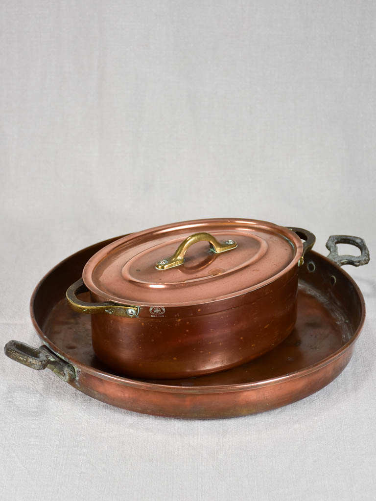 Two late nineteenth-century French copper cooking pots