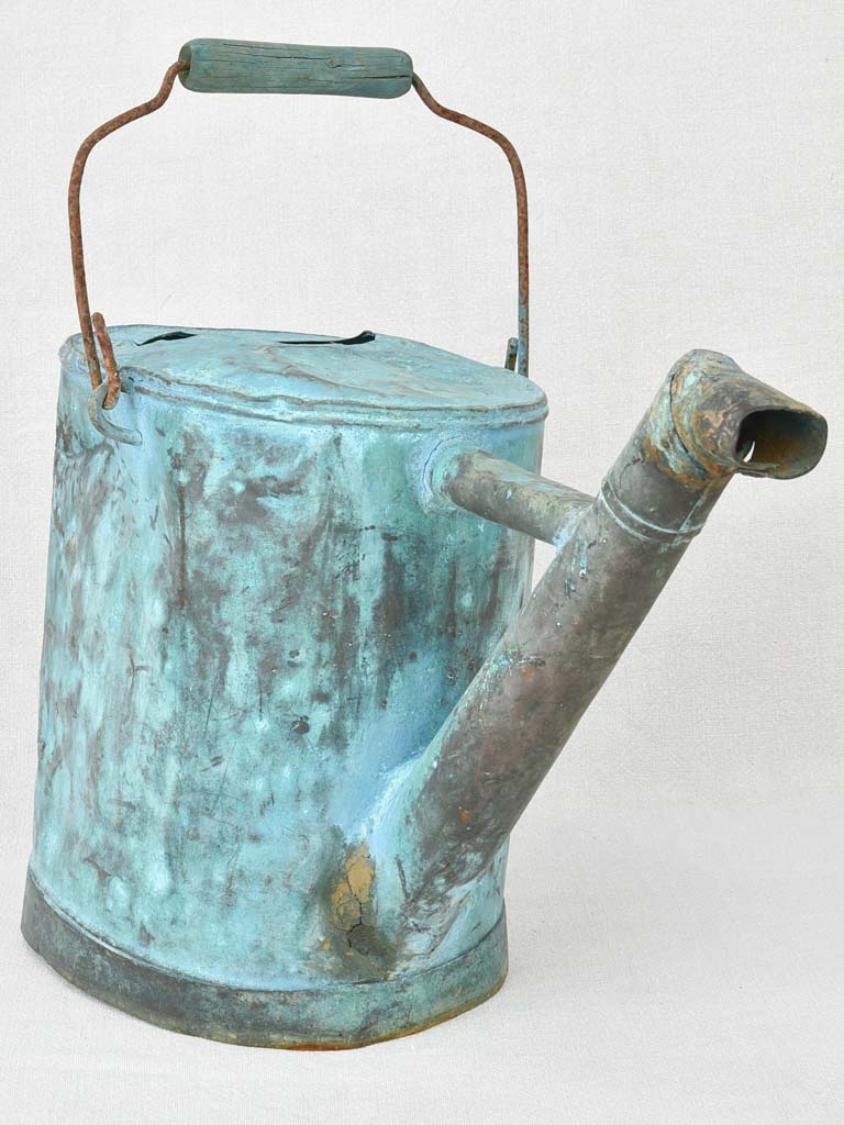 Antique French copper watering can with blue patina