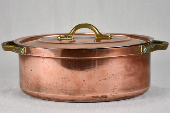 Two late nineteenth-century French copper cooking pots