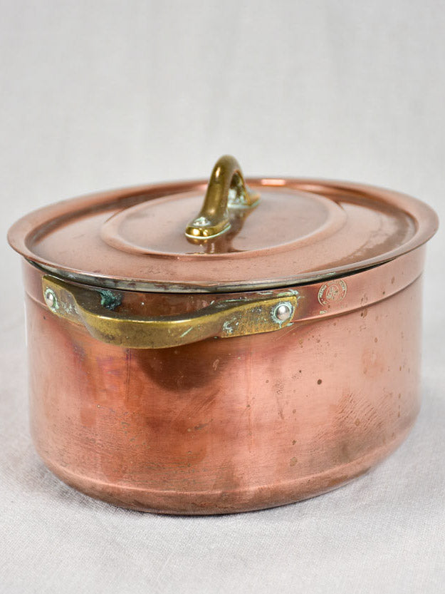 Two late nineteenth-century French copper cooking pots