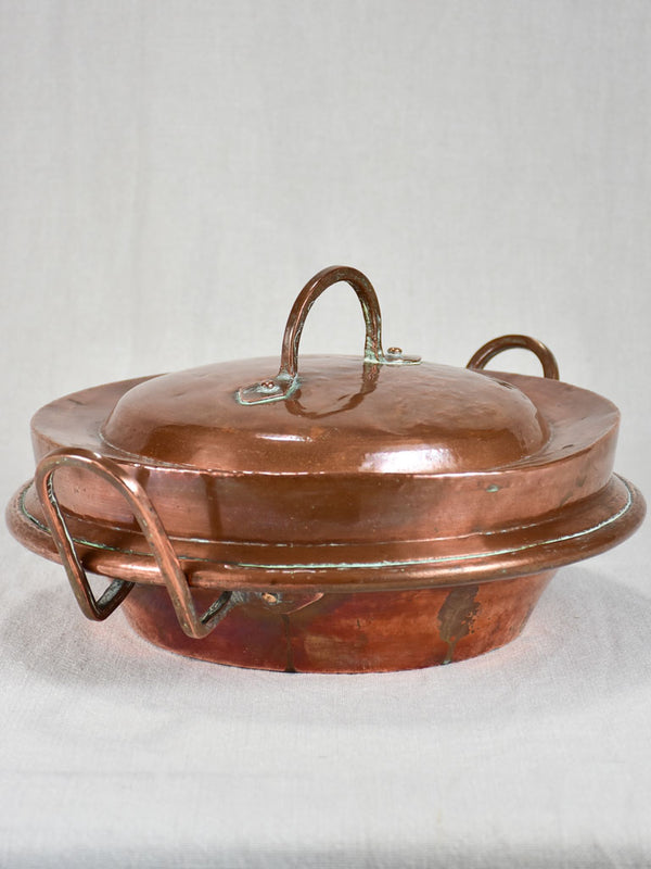 Antique riveted French copper casserole