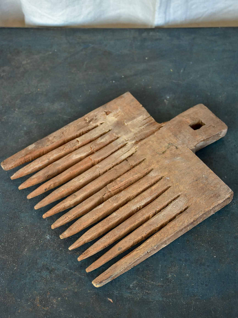 Antique French wooden wool comb