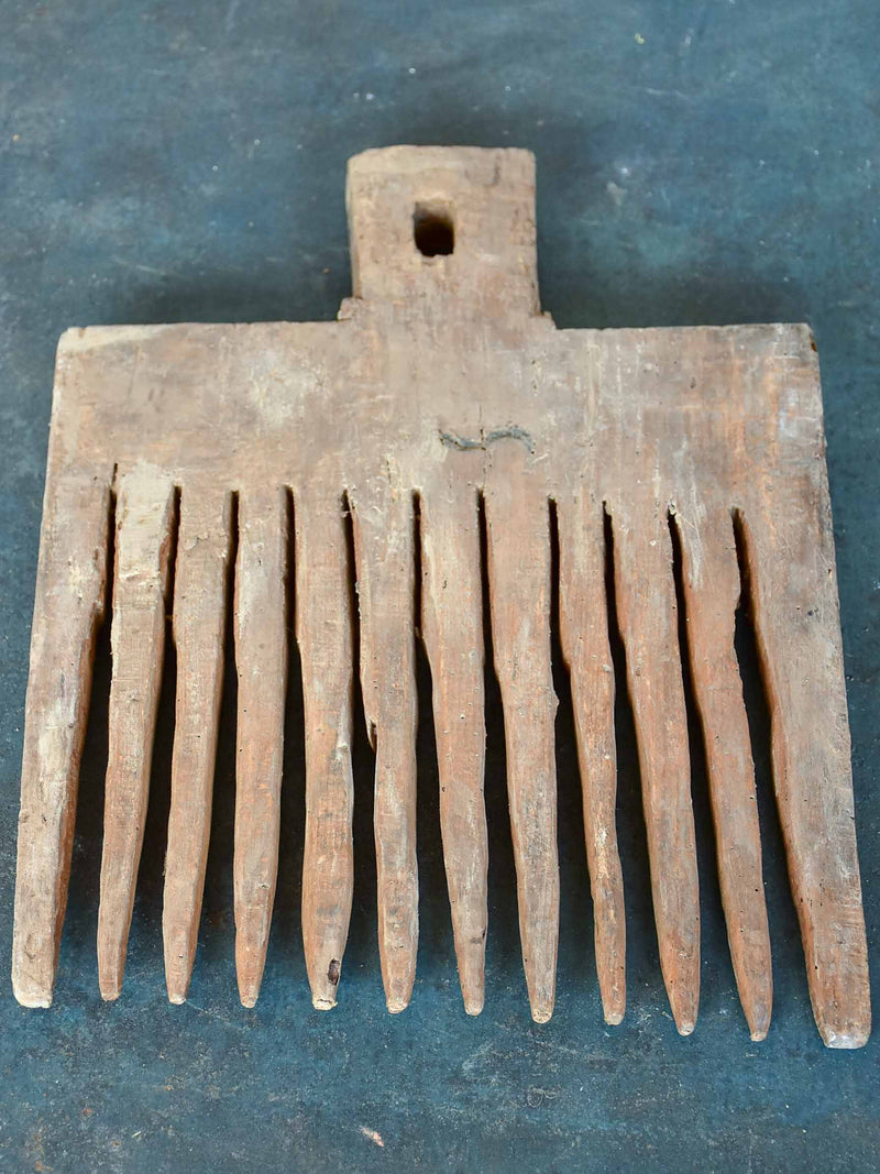 Antique French wooden wool comb