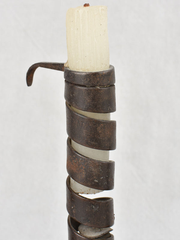 Antique spiral stem iron candlestick design