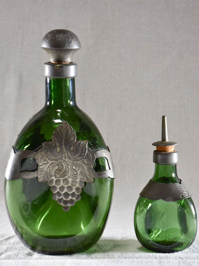 Two aperetif carafes with green glass