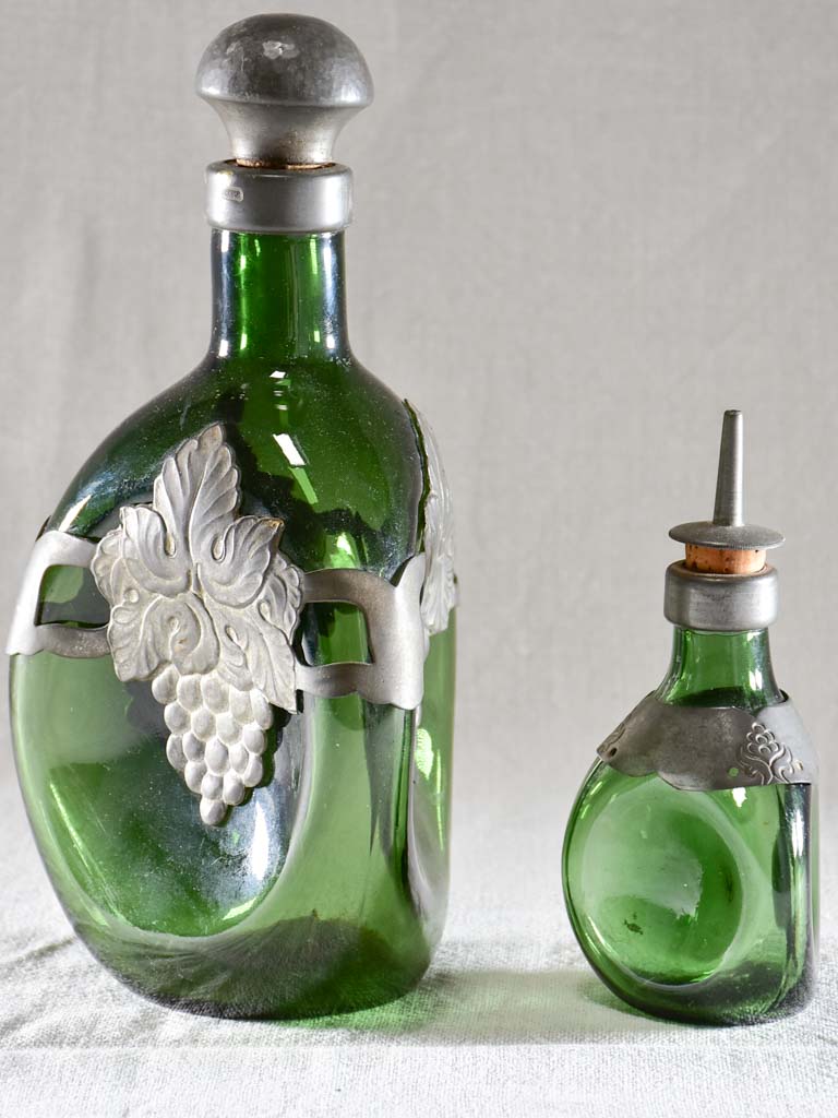 Two aperetif carafes with green glass