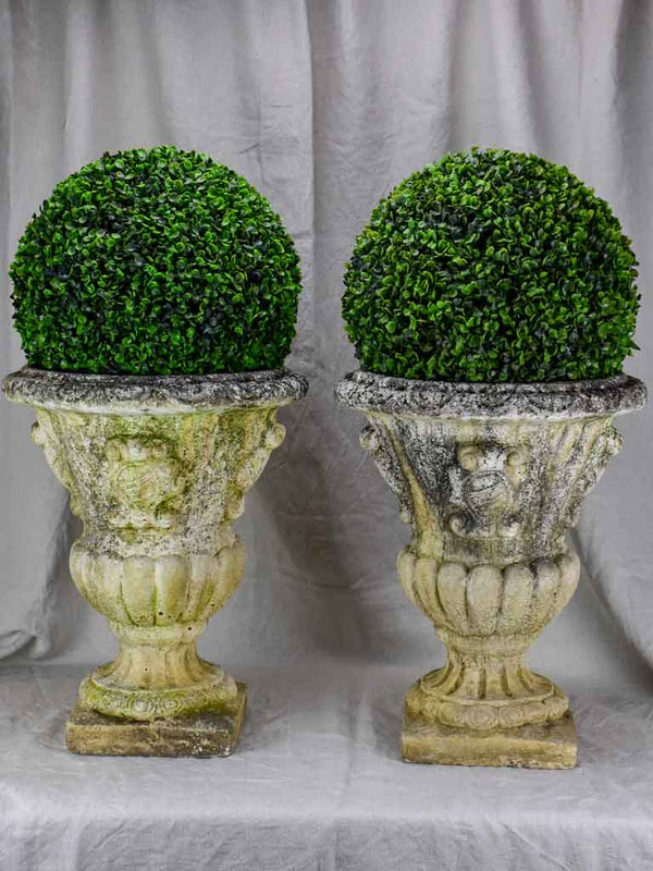 Pair of 1940's French Medici urns with coat of arms